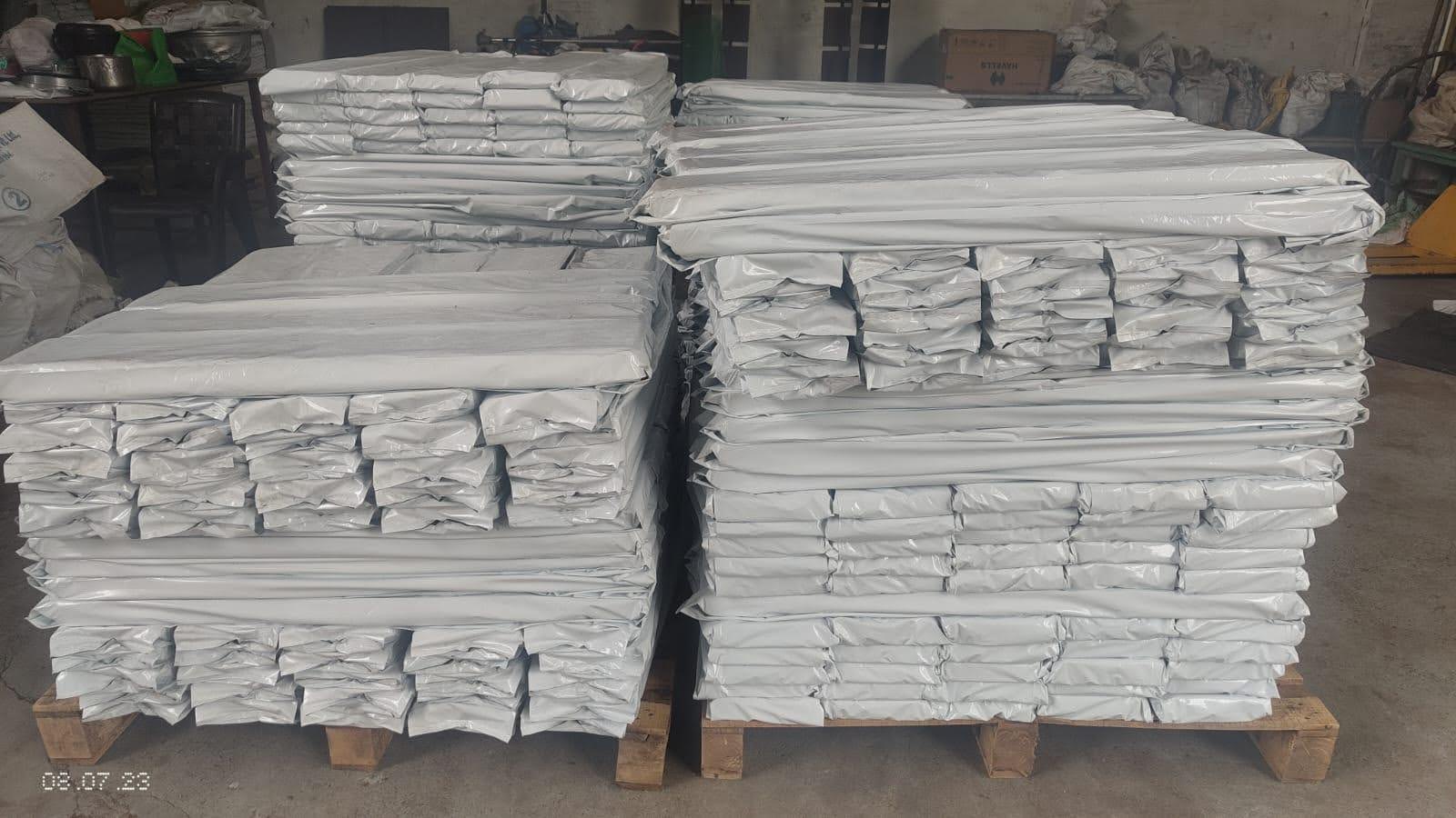 Coir Pith Blocks Stacked in Warehouse