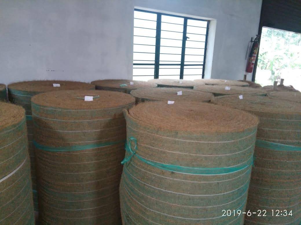 Coir Pith Blocks Stacked in Warehouse