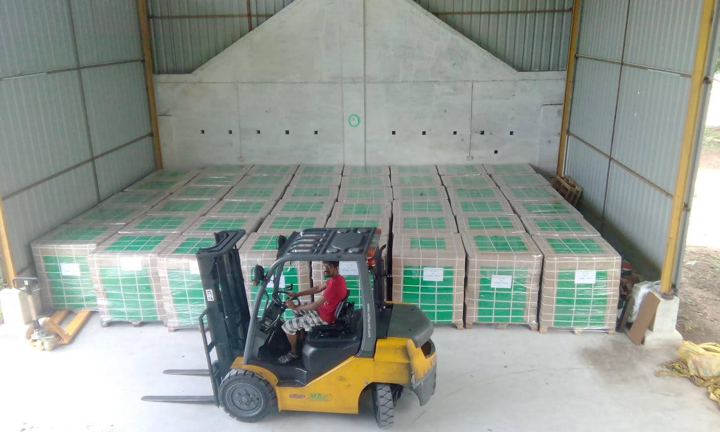 Coir Pith Blocks Stacked in Warehouse